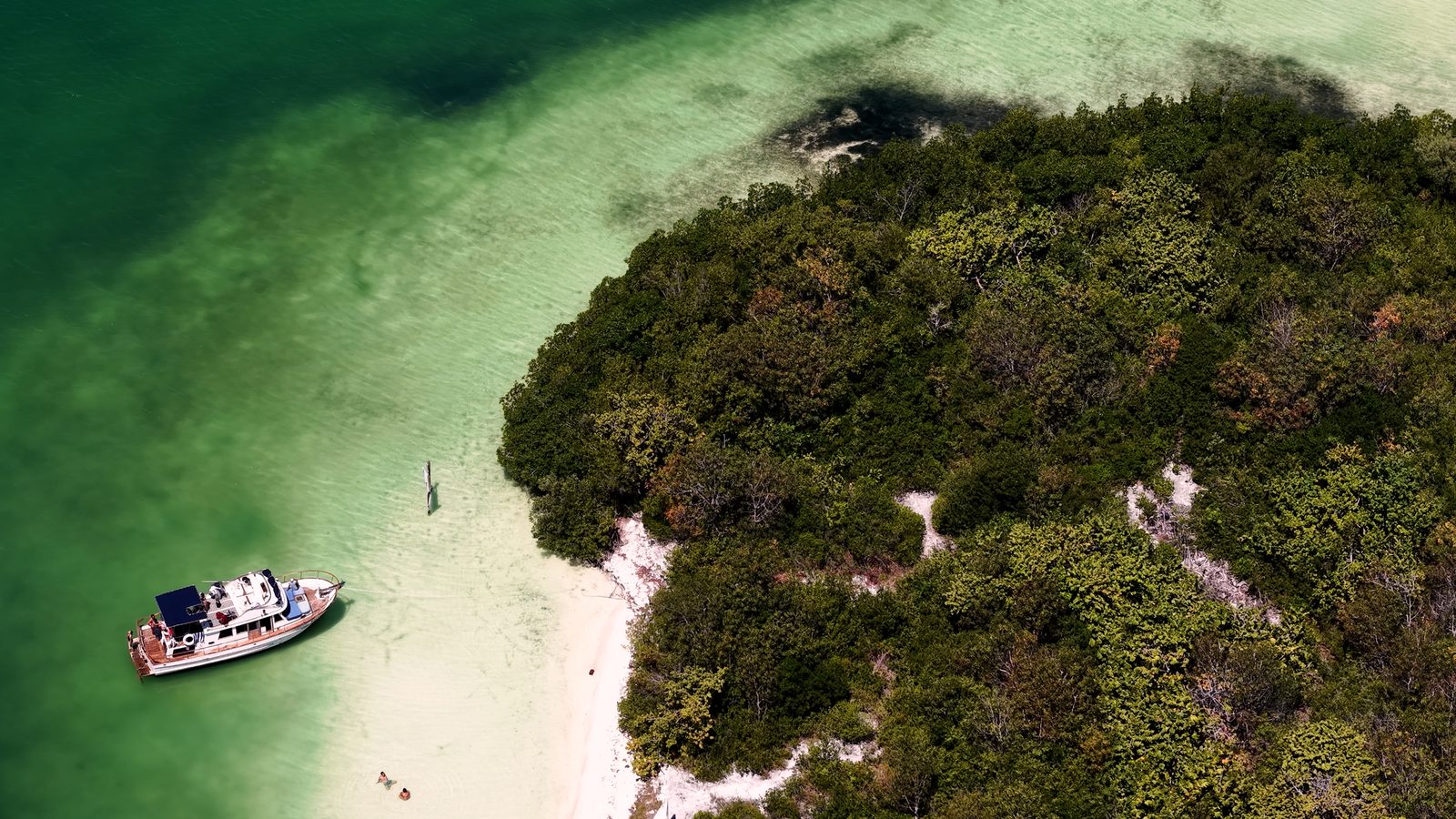 The Tafil anchored at a secluded white-sand spit in the lagoon
