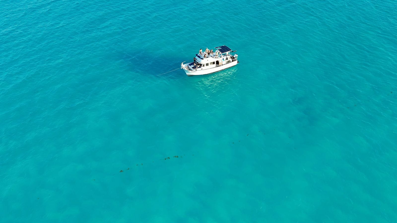 High aerial view of the Tafil alone in the turquoise Caribbean
