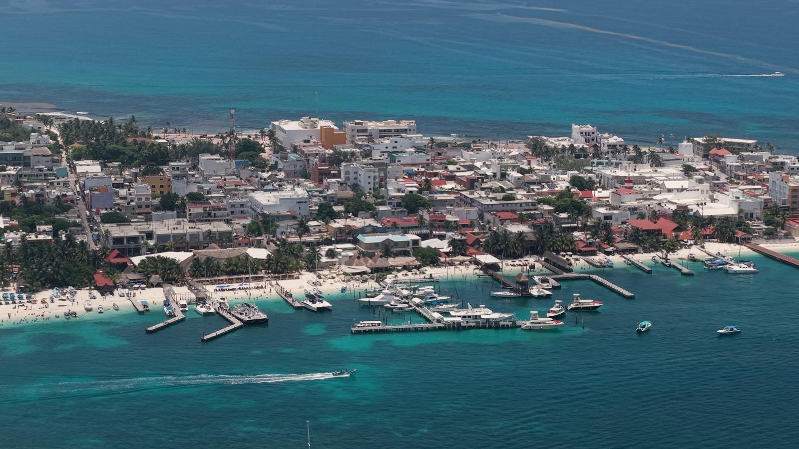 Aerial view of the town and harbour of Isla Mujeres with the ferry docks
